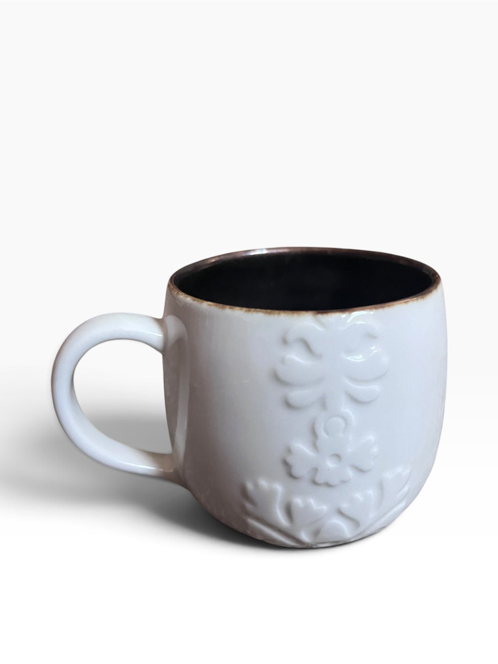 Starbucks White Ceramic Mug with Black Interior and Embossed Design